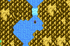 A canoe approaches the Waterfall Cavern